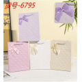 Фото товара - Пакет Бумажный 30*42 Атласный бантик (в ассорт.) QZGZD-6795А, (Yiwu Ouwei Paper packaging Co.,Ltd.)
