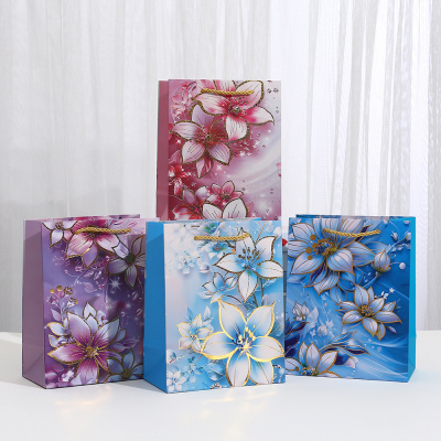 Большое фото товара - Пакет Бумажный 26*32 Цветочная палитра ( в ассорт.,фольга) К7008М, (Yiwu Ouwei Paper packaging Co.,Ltd.), 13-1023566. Вариант №1